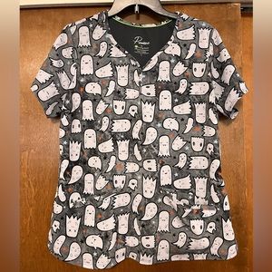 Ghost Halloween scrub top and black jogger scrub pants